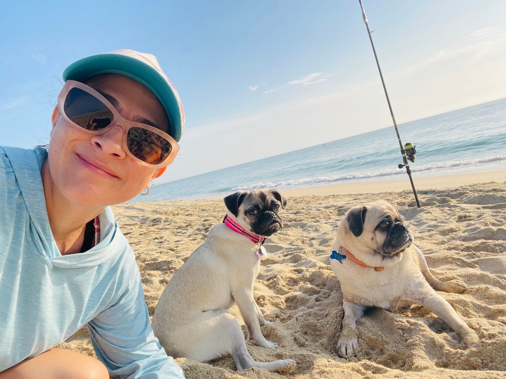 Sofia with dogs on Beach
